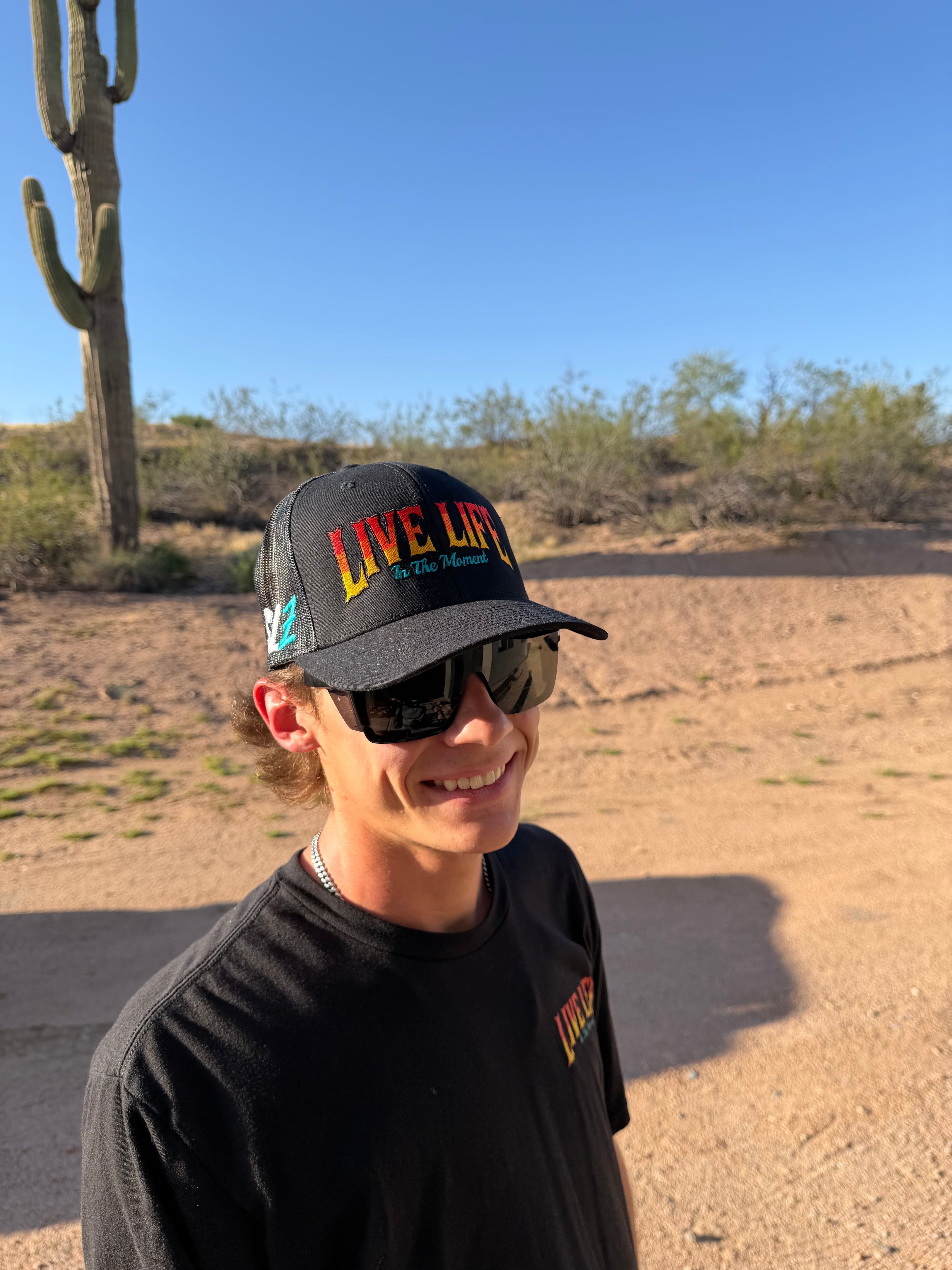 Live Life in the Moment Embroidered curved bill Trucker Hat