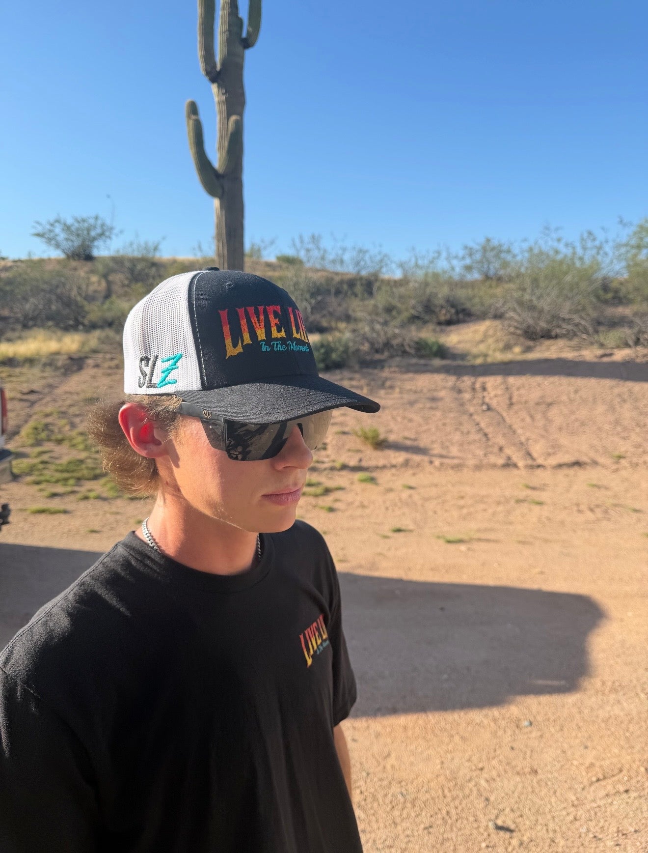 Live Life in the Moment Embroidered curved bill Trucker Hat